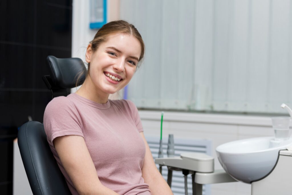 Beautiful woman smiling while seated in a dental chair at a dental office in Kokomo
